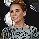 Singer Miley Cyrus arrives at the 2011 MTV Video Music Awards in Los Angeles