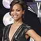 Actress Zoe Saldana poses on arrival at the 2011 MTV Video Music Awards in Los Angeles