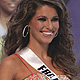 Miss France Laury Thilleman walks on stage as she is chosen as a finalist in the Miss Universe 2011 pageant in Sao Paulo