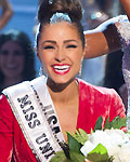 Miss USA Olivia reacts as she is crowned by Miss Universe 2011 Lopes during Miss Universe pageant in Las Vegas