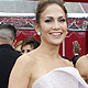 Jennifer Lopez and Demi Moore (R) arrive at the 82nd Academy Awards in Hollywood