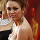Miley Cyrus arrives at the 82nd Academy Awards in Hollywood