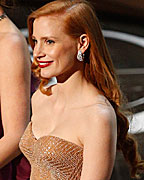 Presenters Jessica Chastain and Jennifer Garner walk onto the stage to give out the award for best foreign language film at the 85th Academy Awards in Hollywood, California