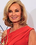 Jessica Lange poses with her award for outstanding supporting actress in a miniseries or movie backstage at the 64th Primetime Emmy Awards in Los Angeles