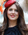 Race goers pose for photos on the first day of Royal Ascot, southwest of London