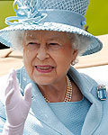 Britain's Queen Elizabeth waves as she arrives to attend the first day of racing at Royal Ascot, southwest of London