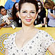 Maya Rudolph from the film 'Bridesmaids' poses as she arrives at the 18th annual Screen Actors Guild Awards