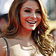 Maria Menounos smiles on arrival at the 18th annual Screen Actors Guild Awards in Los Angeles