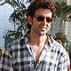 Hrithik Roshan, Kinatro Mori and Rakesh Roshan arrive after Kites promotion in Kolkata