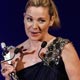 Actress Kim Cattrall presents an award during the Council of Fashion Designers of America annual awards ceremony in New York