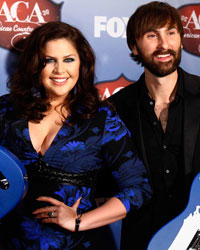 Charles Kelley (L), Hillary Scott and Dave Haywood of Lady Antebellum pose with their awards for group of the year and single by a group for 'Downtown' during the 4th annual American Country Awards in Las Vegas, Nevada