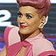 Katy Perry holds up her special achievement award at the 2011 American Music Awards