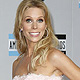 Cheryl Hines poses on arrival at the 2011 American Music Awards in Los Angeles