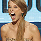 Taylor Swift reacts as she accepts the Favorite Country Music Album award for 'Speak Now' at the 2011 American Music Awards