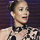 Jennifer Lopez accepts the Favorite Latin Music Artist award at the 2011 American Music Awards in Los Angeles