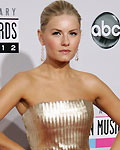 Canadian actress Elisha Cuthbert arrives at the 40th American Music Awards in Los Angeles