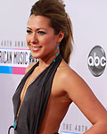 Singer Colbie Caillat arrives at the 40th American Music Awards in Los Angeles