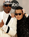 MC Hammer and Psy backstage at the 40th American Music Awards in Los Angeles