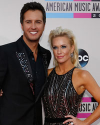 Singer Luke Bryan with his wife Caroline Boyer arrive at the 41st American Music Awards in Los Angeles, California