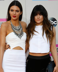 Kendall (L) and Kylie Jenner at the 41st American Music Awards in Los Angeles, California