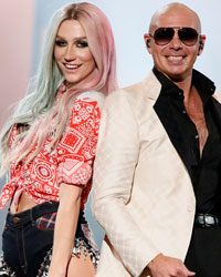 Pitbull performs his song 'Timber' with Ke$ha (L) at the 41st American Music Awards in Los Angeles, California