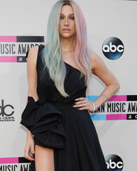 Musician Kesha arrives at the 41st American Music Awards in Los Angeles, California