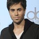 Singer Enrique Iglesias poses with his award at the 2008 American Music Awards in Los Angeles