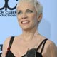 Singer Annie Lennox poses with her award of merit at the 2008 American Music Awards in Los Angeles