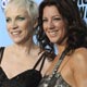 Singers Annie Lennox and Sarah McClachlan pose backstage after performing at the 2008 American Music Awards in Los Angeles