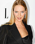 Honoree Uma Thurman poses as she arrives at the 19th Annual ELLE Women in Hollywood dinner in Beverly Hills