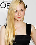 Honoree Elle Fanning poses as she arrives at the 19th Annual ELLE Women in Hollywood dinner in Beverly Hills