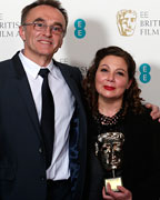 Tessa Ross celebrates with Danny Boyle after winning the Award for Outstanding Contribution to British Cinema the British Academy of Film and Arts (BAFTA) awards ceremony at the Royal Opera House in London