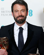 Ben Affleck celebrates after winning the Awards for Best Film and Best Director for the movie Argo at the British Academy of Film and Arts (BAFTA) awards ceremony at the Royal Opera House in London