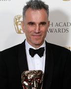 Daniel Day-Lewis celebrates after winning the Best Actor award for Lincoln at the British Academy of Film and Arts (BAFTA) awards ceremony at the Royal Opera House in London