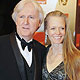 Director James Cameron and his wife, actress Suzy Amis, arrive at the British Academy Of Film and Television Arts (BAFTA) awards ceremony