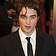 Actor Robert Pattinson arrives at the BAFTA awards ceremony in London