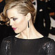 Actress Melissa George arrives for the BAFTA awards ceremony in London