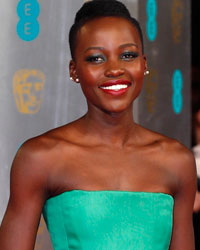 Actress Lupita Nyong'o arrives at the British Academy of Film and Arts (BAFTA) awards ceremony at the Royal Opera House in London