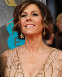 Tom Hanks and Rita Wilson arrive at the British Academy of Film and Arts (BAFTA) awards ceremony at the Royal Opera House in London