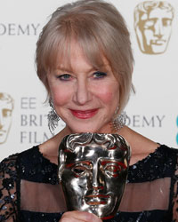 Helen Mirren celebrates winning the Fellowship award at the British Academy of Film and Arts (BAFTA) awards ceremony at the Royal Opera House in London