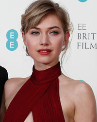 Jack Huston (L) and Imogen Poots pose in the Winner's Area at the British Academy of Film and Arts (BAFTA) awards ceremony at the Royal Opera House in London