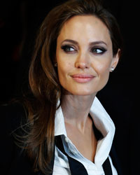 Angelina Jolie arrives at the British Academy of Film and Arts (BAFTA) awards ceremony at the Royal Opera House in London