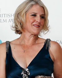 Catherine Martin (R) and Beverley Dunn celebrate after winning Film Production Design for 'The Great Gatsby' at the British Academy of Film and Arts (BAFTA) awards ceremony at the Royal Opera House in London