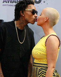 Wiz Khalifa and Amber Rose arrive at the 2013 BET Awards in Los Angeles, California