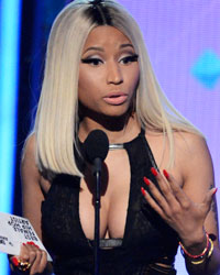 Nicki Minaj accepts the award for best female hip hop artist at the 2013 BET Awards in Los Angeles, California