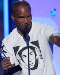 Jamie Foxx accepts the best actor award at the 2013 BET Awards in Los Angeles, California