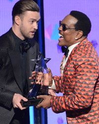 Justin Timberlake presents the lifetime achievement award to Charlie Wilson at the 2013 BET Awards in Los Angeles, California