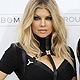 Singer Fergie poses with Taboo as they arrive at the 2011 Billboard Music Awards show in Las Vegas