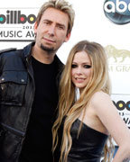 Musicians Chad Krogoer and Avril Lavigne arrive at the Billboard Music Awards in Las Vegas, Nevada