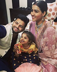 Suresh Raina with his wife and daughter